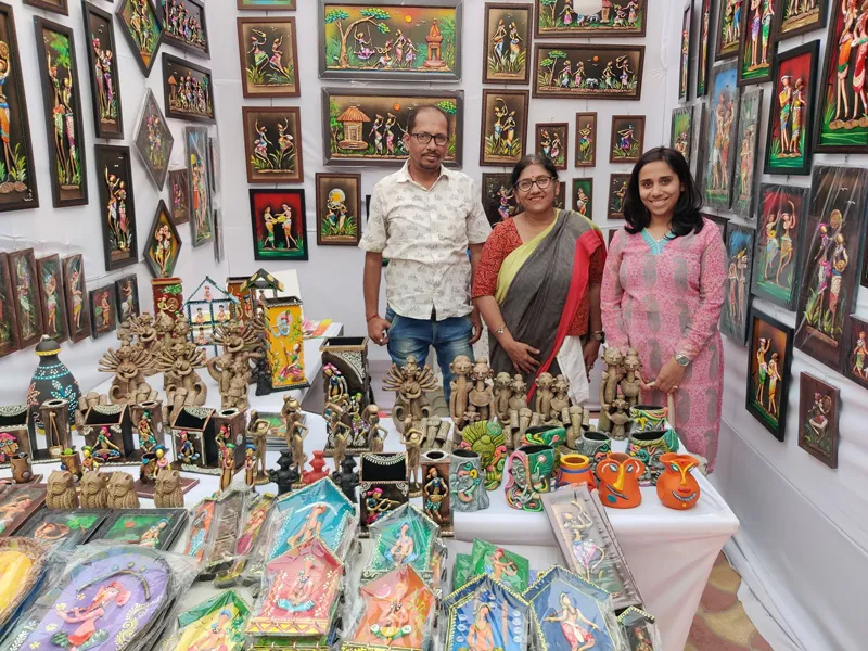 Sushmita Kaneri with handcrafted products at an exhibition