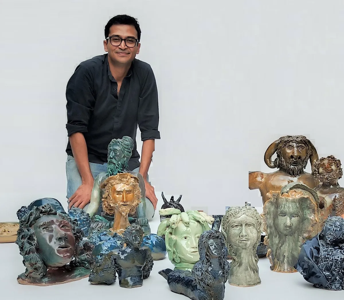 Aravind Thippanaik with his sculptors