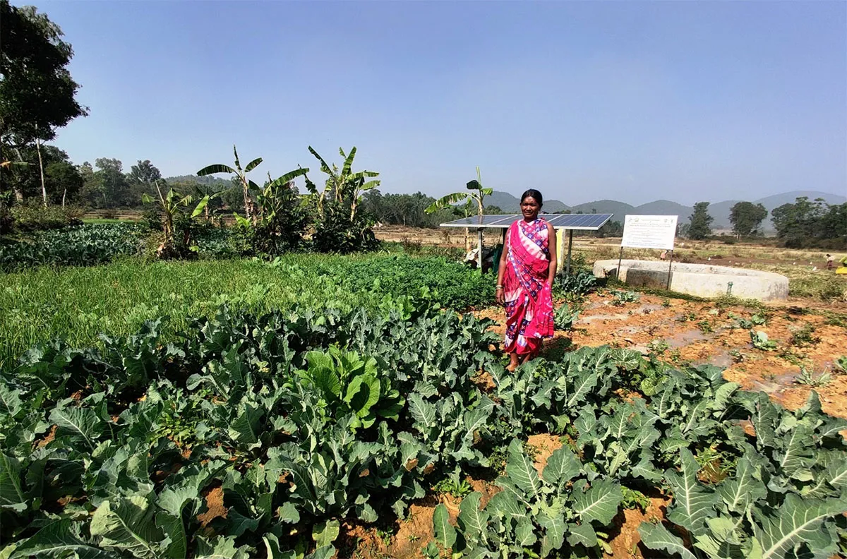 woman farmer with her crops