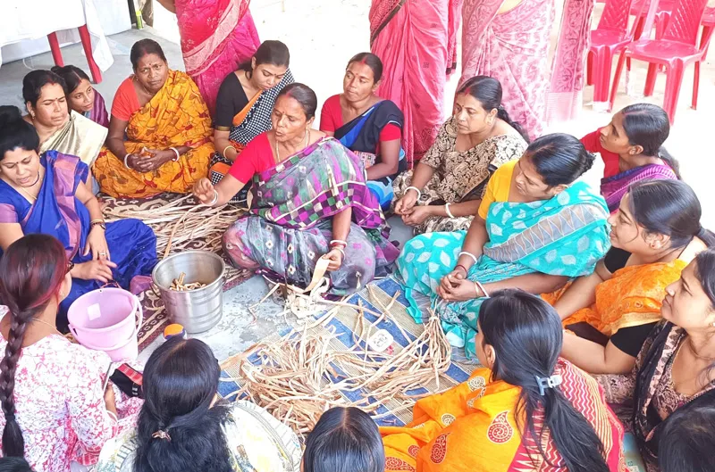 women working on hyacinth