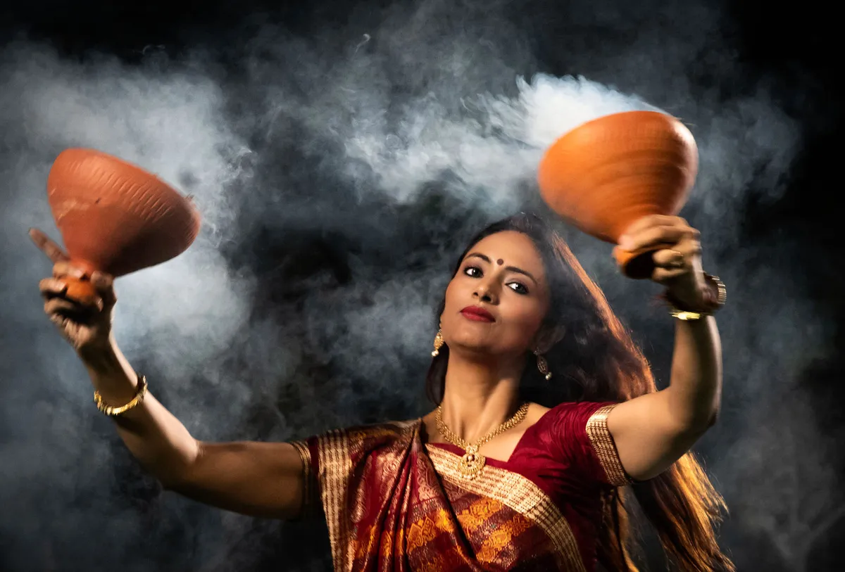 Dhunuchi dance is performed on the eighth and tenth day (Dashami) of Durga Puja