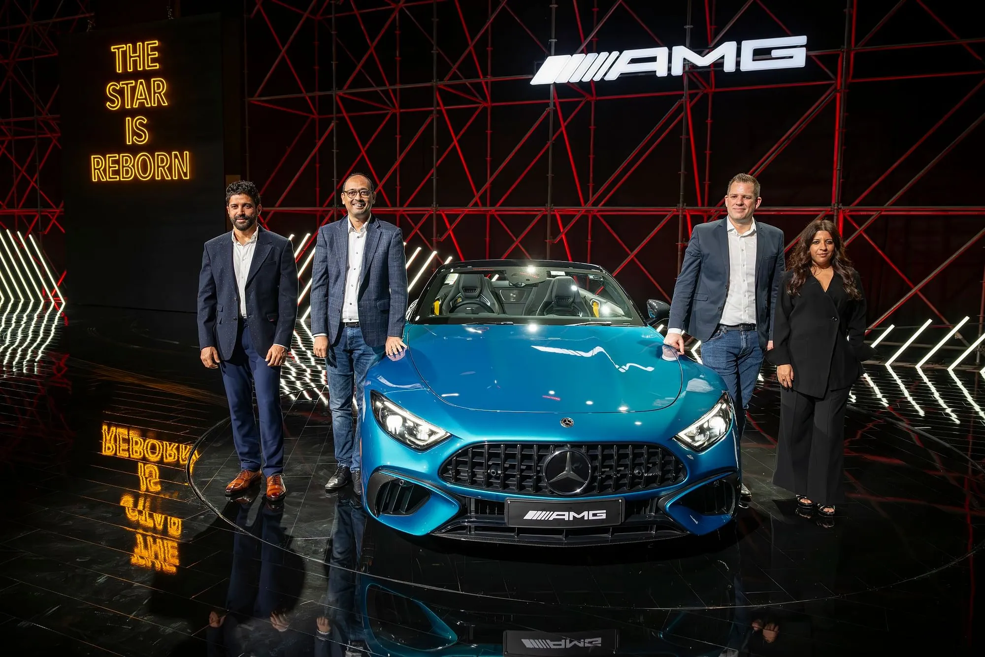 Santosh Iyer, MD & CEO and Lance Bennett launching the new AMG SL 55 4MATIC+ roadster version with Bollywood Actor Farhan Akhtar and Director Zoya Akhtar.  