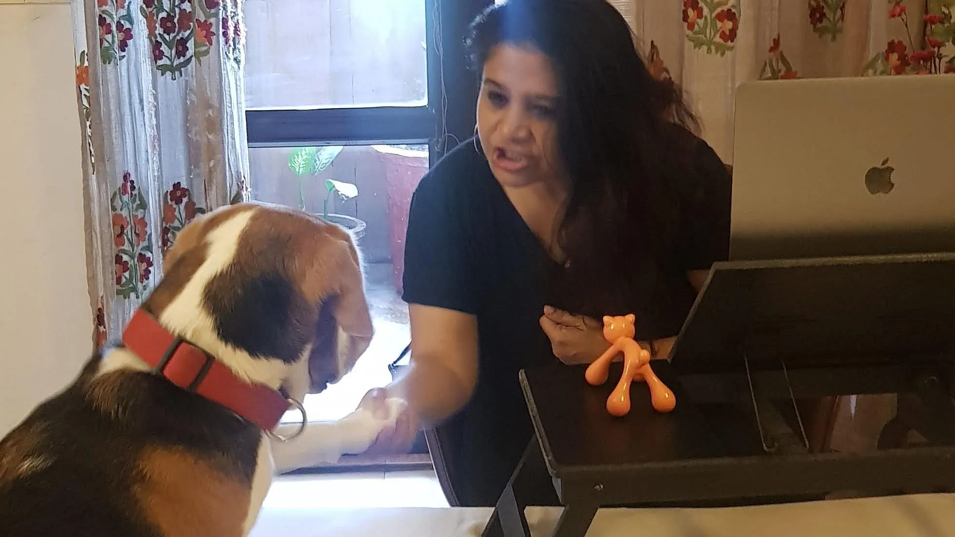 Swati with her pet beagle Zazu.  