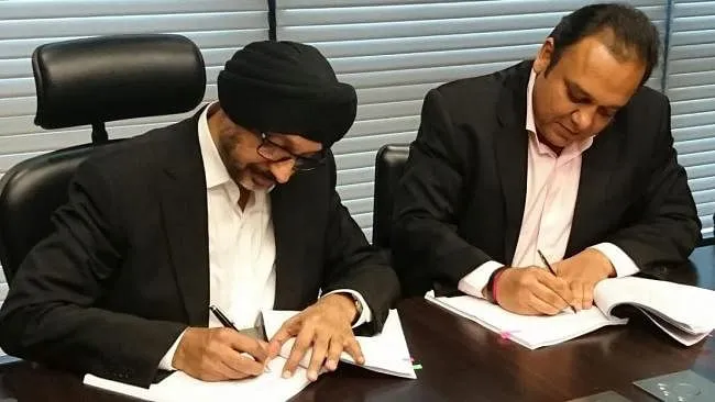 File image of NP Singh and Punit Goenka signing the Ten Sports deal  