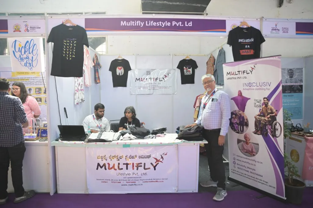 A group of people standing in front of a booth

AI-generated content may be incorrect.