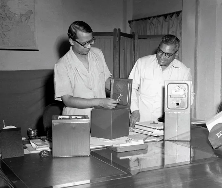 Examination of samples of ballot boxes specially designed by Godrej for use in India’s first general elections in 1951  Photo: PIB