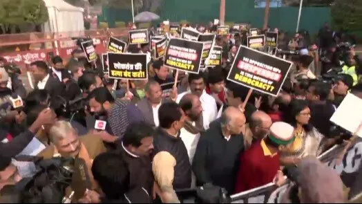 Opposition MPs take out protest march from Parliament over mass suspension  - India Today