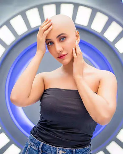 Rukmini stuns fans with bold bald look for her upcoming sci-fi comedy -  Times of India