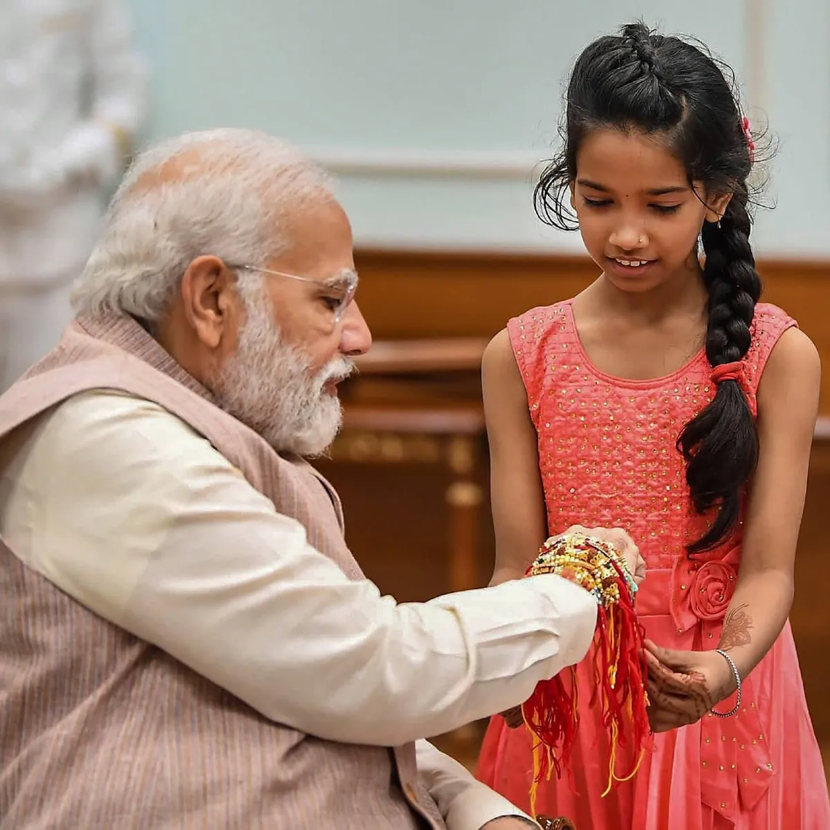 WATCH | PM Modi Celebrates 'Special' Raksha Bandhan with Daughters of Staff  Members - News18