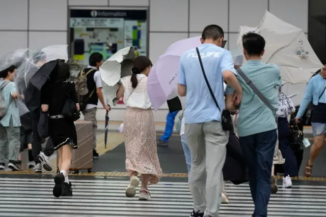 Evacuation ordered in northern Japan, power out, flights, trains canceled  as a typhoon approaches