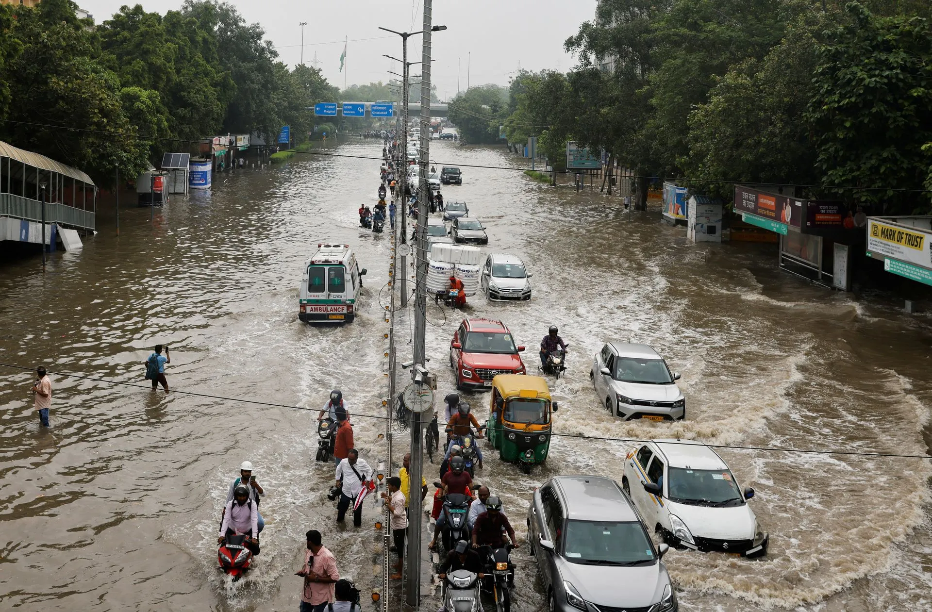 New Delhi races to open jammed flood gates as river surge halts India's  capital | Reuters