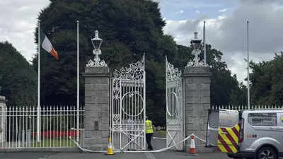 Van driver arrested after crashing into gates outside Irish prime minister's office in Dublin