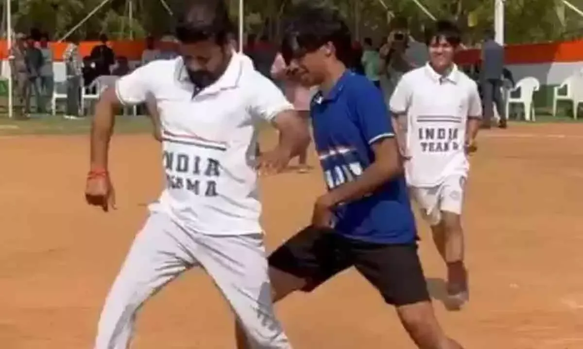 CM Revanth Reddy Plays Football for Fun at Hyderabad Central University