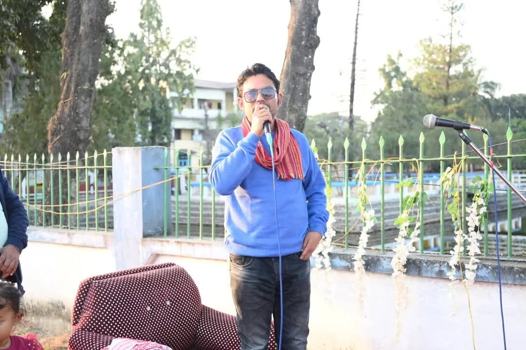 ম