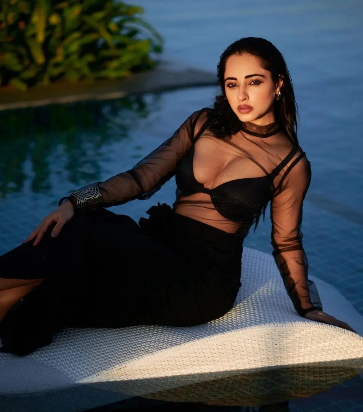 Actress Niyati Fatnani sets the temperature soaring in a plunging neckline bold black dress Fans call her Mirchi