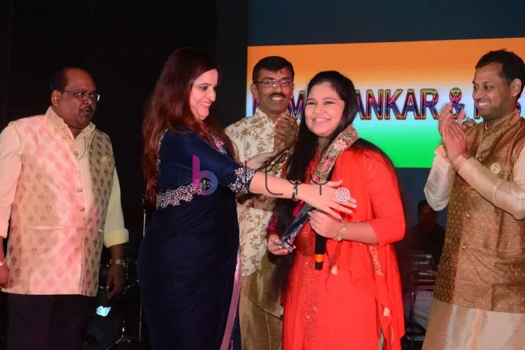 Sneha Shankar being felicitated