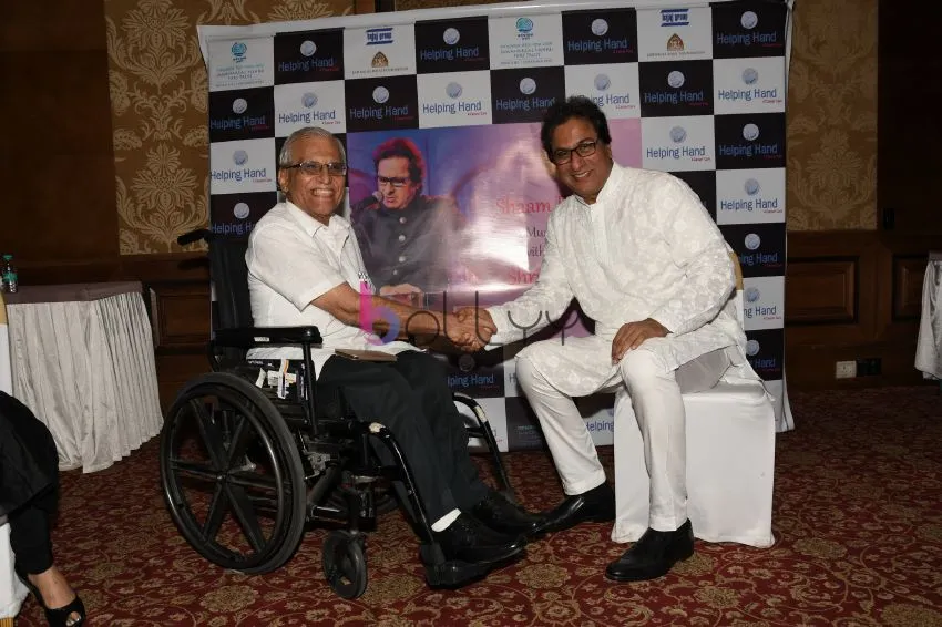 Dr. Suresh Advani, Talat Aziz