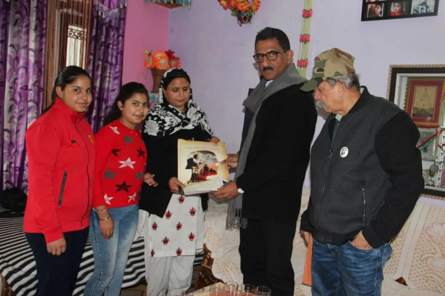 Shri. Sunil Rane, Chairman-Atharva Foundation & Col Sudhir Raje  With Smt Naseema Bano,W/O Rfn Gulam Mahammad Khan At Udampur, J&K..