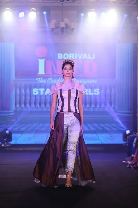 Model Walks The Ramp At Layer'M 2019