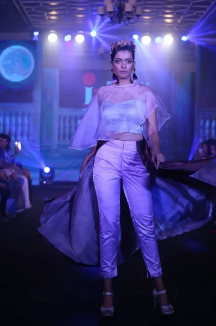 Model Walks The Ramp At Layer'M 2019