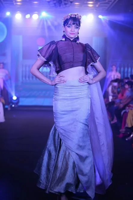 Model Walks The Ramp At Layer'M 2019