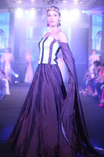 Model Walks The Ramp At Layer'M 2019
