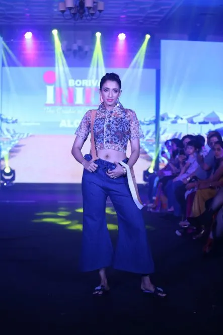 Model Walks The Ramp At Layer'M 2019