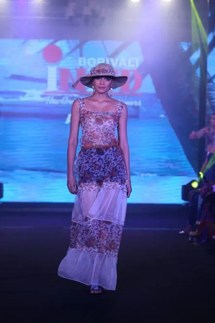 Model Walks The Ramp At Layer'M 2019