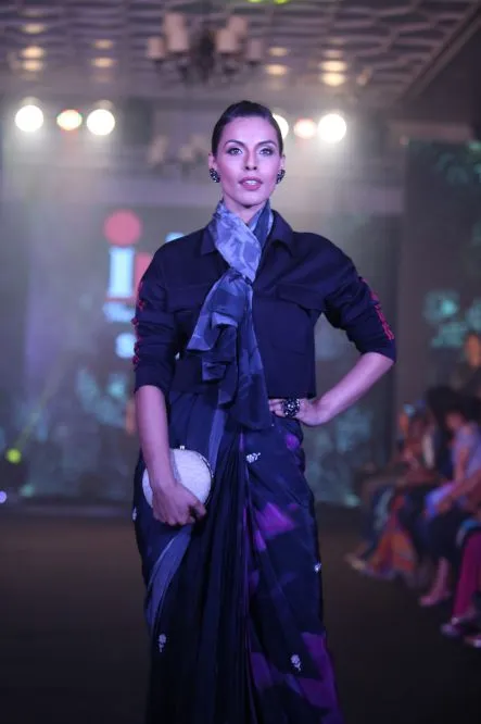 Model Walks The Ramp At Layer'M 2019