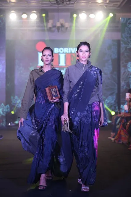 Model Walks The Ramp At Layer'M 2019