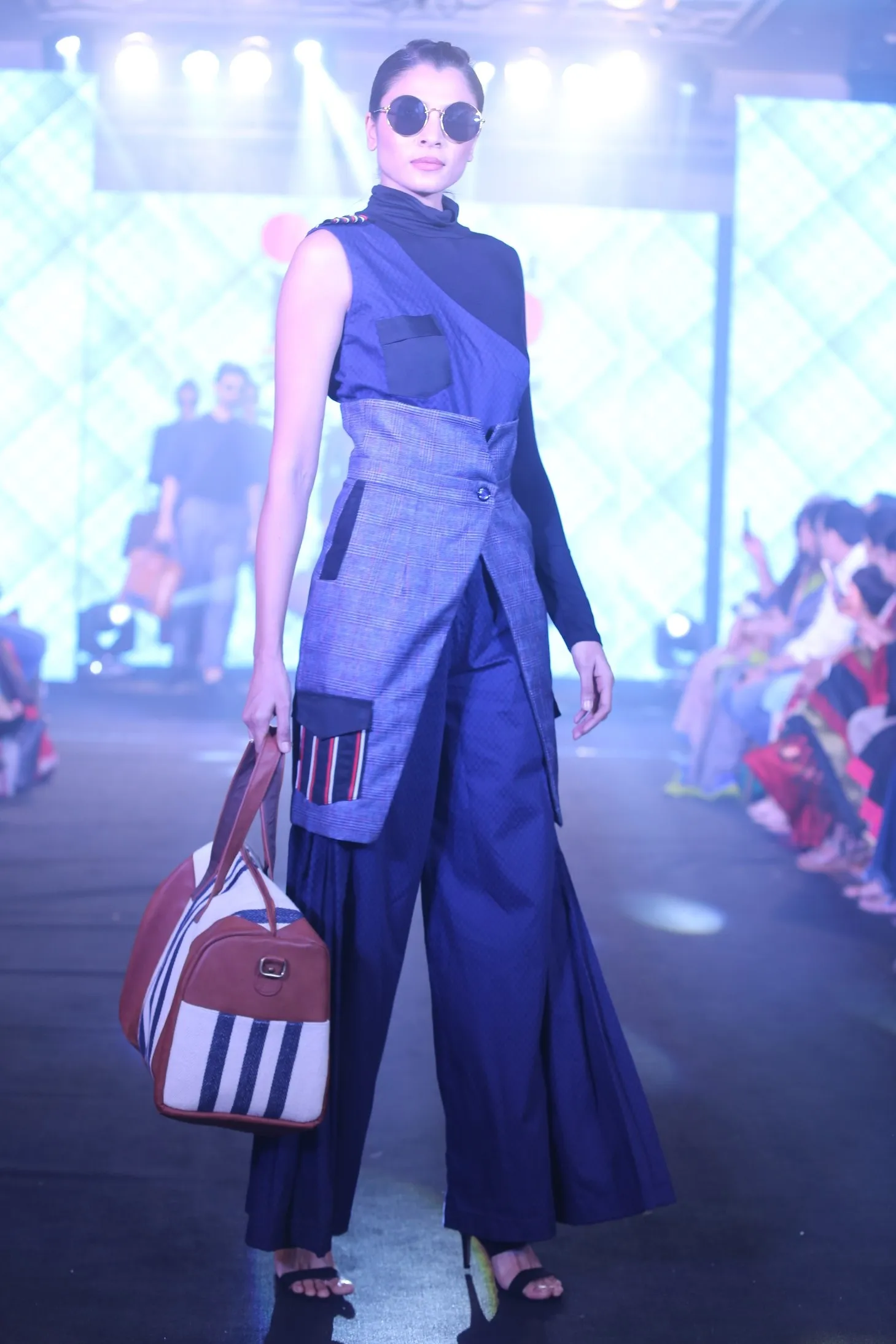 Model Walks The Ramp At Layer'M 2019