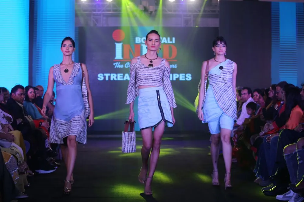 Model Walks The Ramp At Layer'M 2019