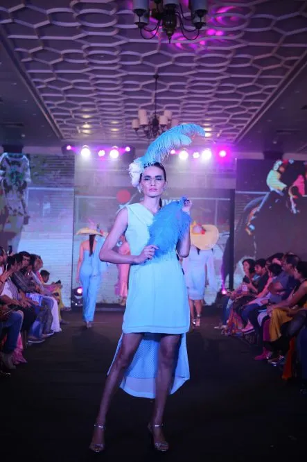 Model Walks The Ramp At Layer'M 2019