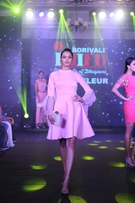 Model Walks The Ramp At Layer'M 2019