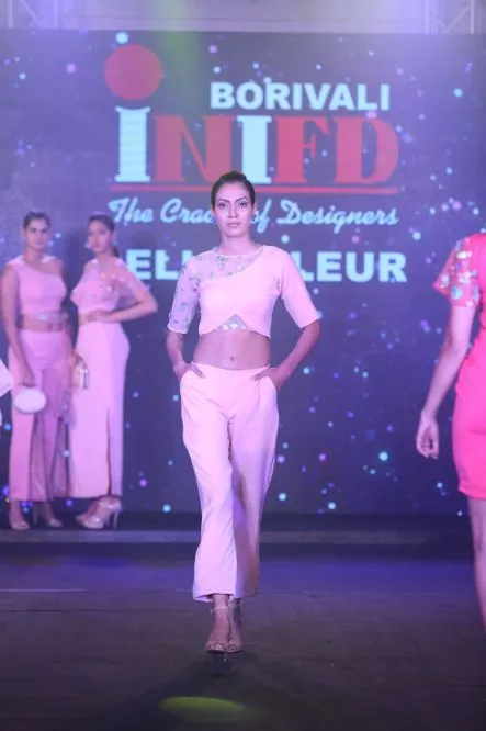Model Walks The Ramp At Layer'M 2019