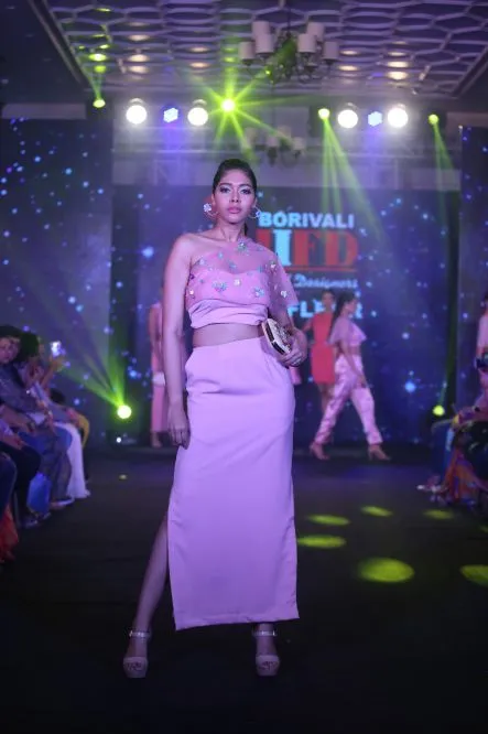 Model Walks The Ramp At Layer'M 2019
