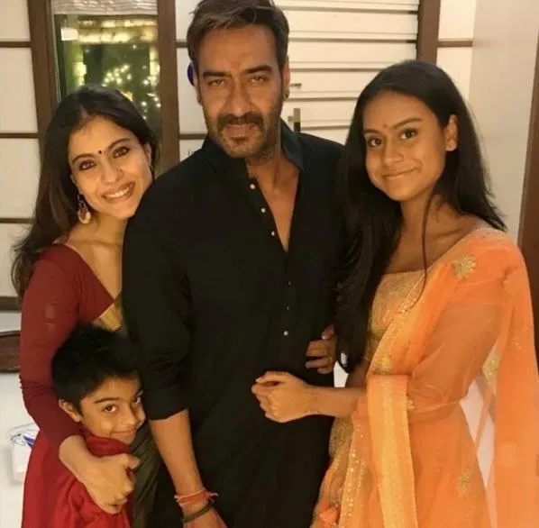 ajay devgan with family