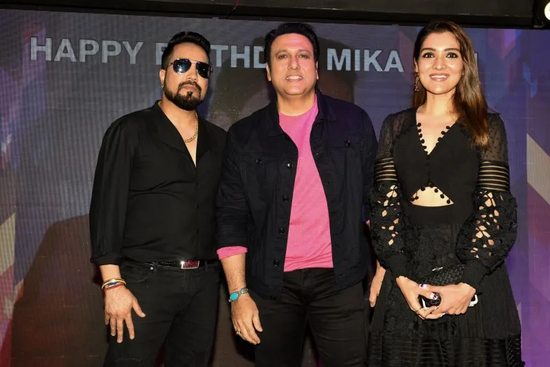 Mika Singh with Govina and Tina Ahuja 