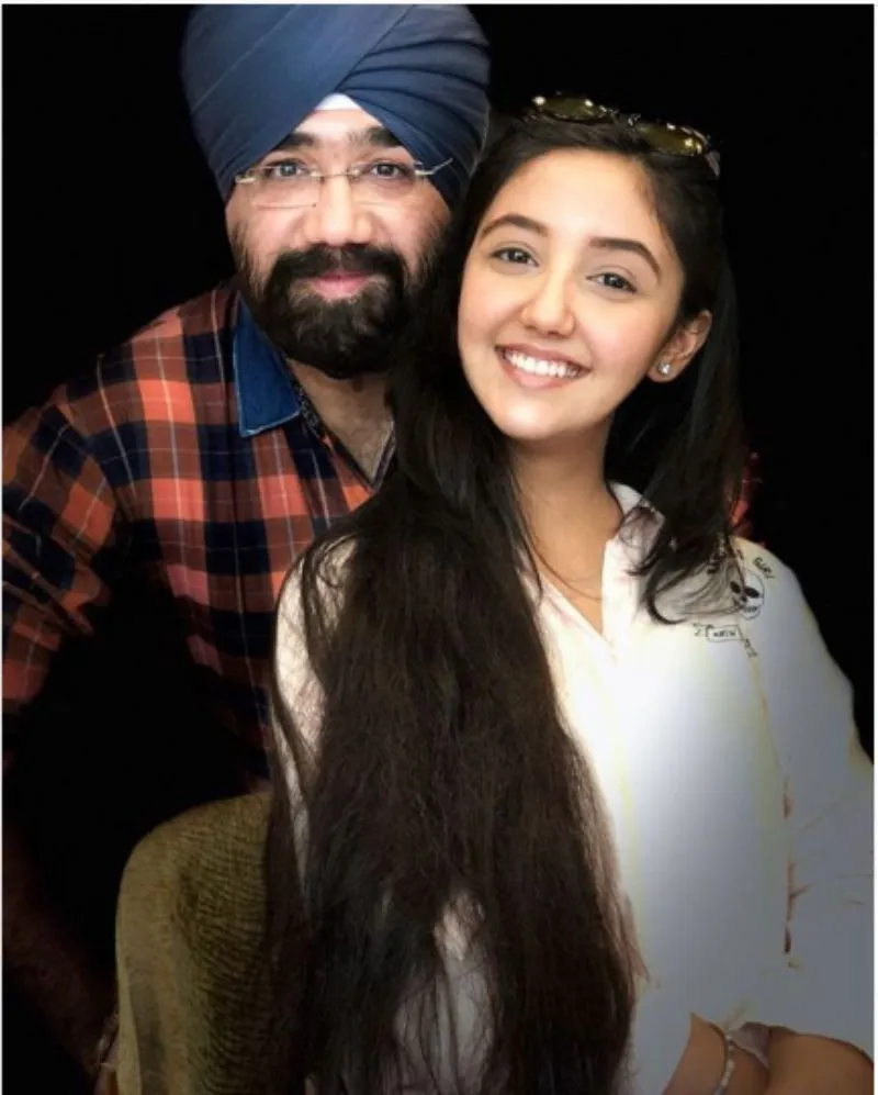Ashnoor Kaur with her father