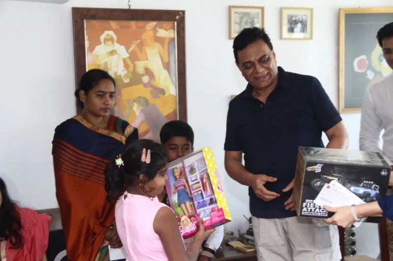 BP Singh Distributing Toys To The Victims Family