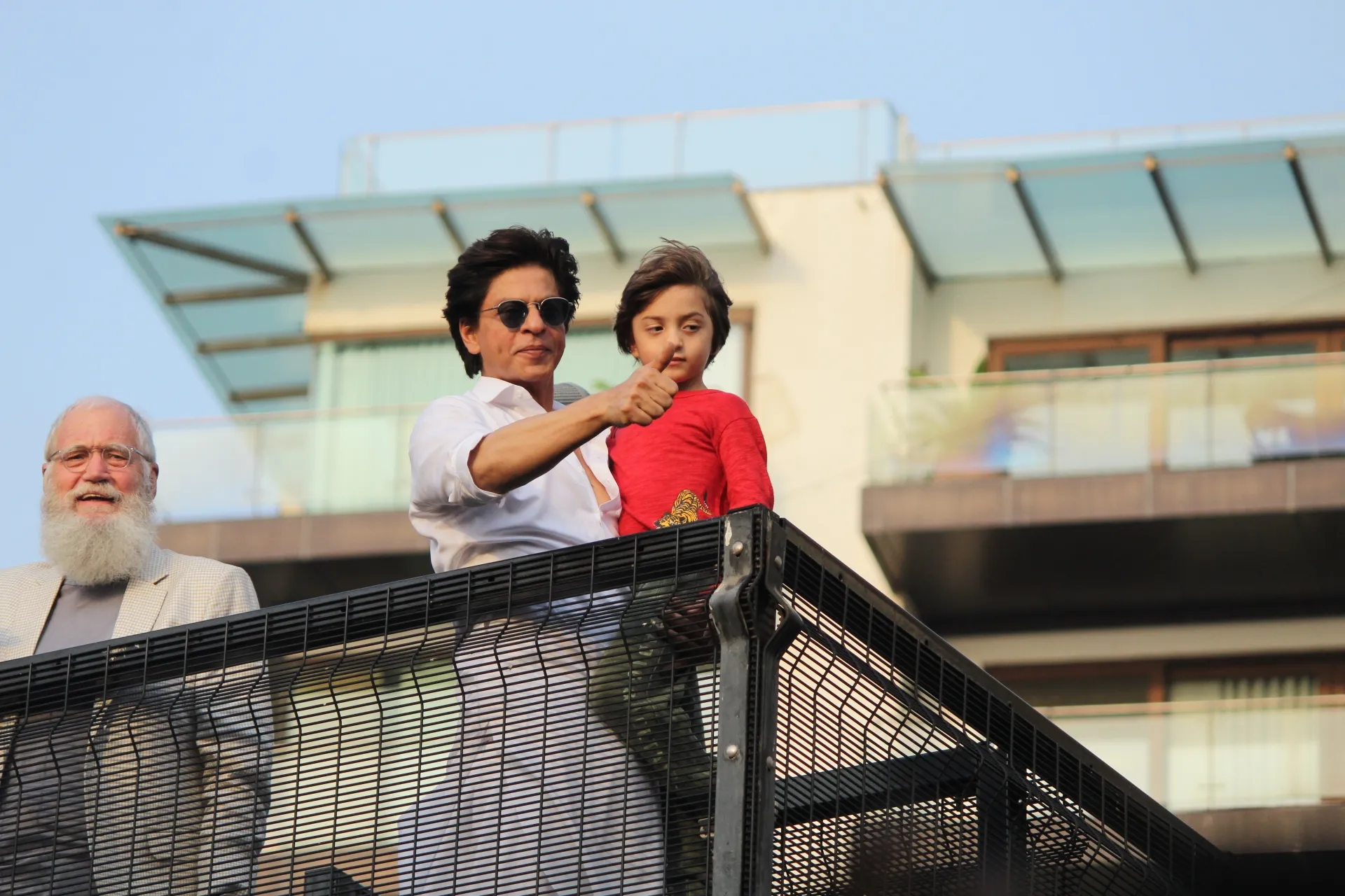 Actor Shahrukh Khan and his son AbRam Khan during a fan meet from the balcony of Mannat on Eid-ul-Fitr celebrations