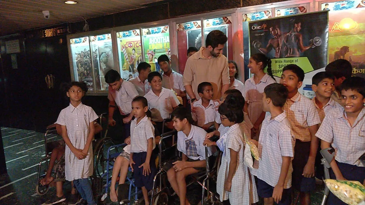 Nandish Sandhu interacting with under privledged Kids