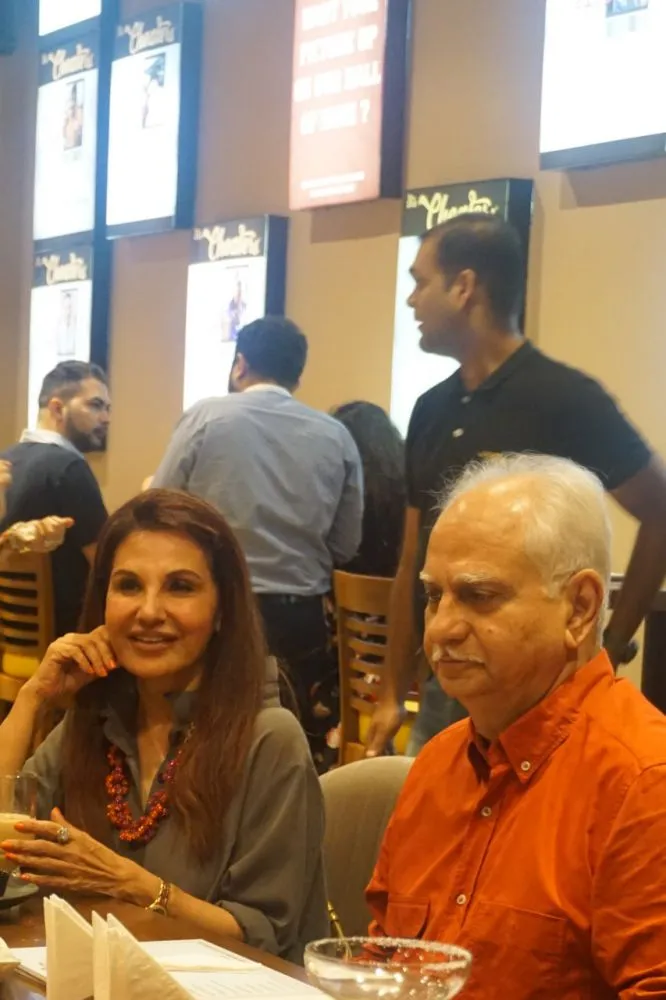 Ramesh Sippy and Poonam Soni enjoying their dinner at 'the Cheaters'