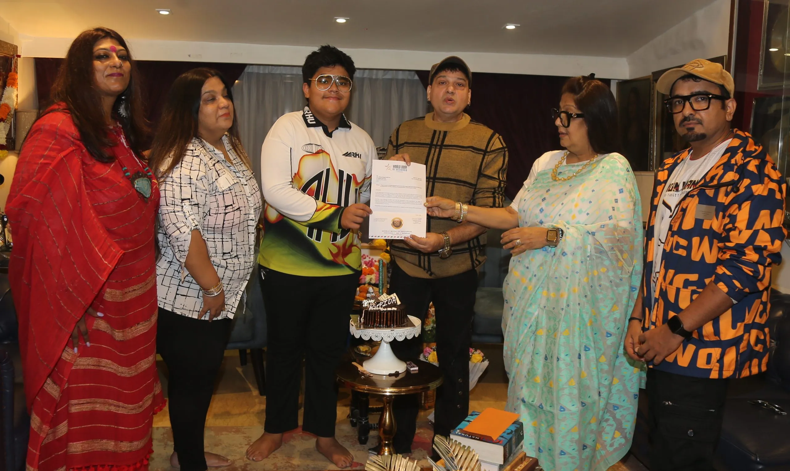 Dr Anusha Srinivasan Iyer, Rema Lahiri Bansal, Swastik Bansal, Usman Khan and Chitrani Lahiri receiving the letter from WBR 2