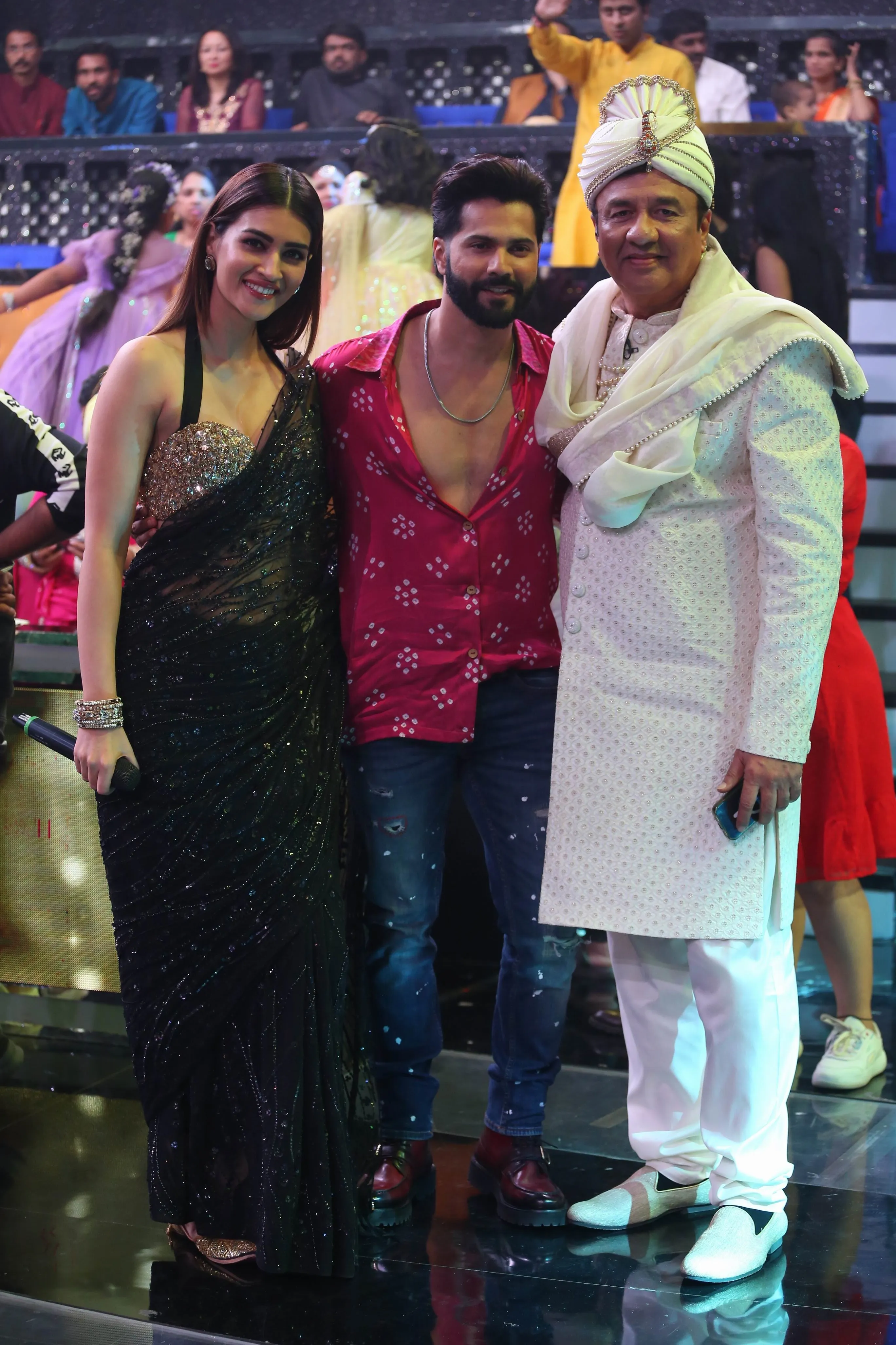 Kriti Sanon and Varun Dhawan along with Judge of Sa Re Ga Ma Pa Li'l Champs