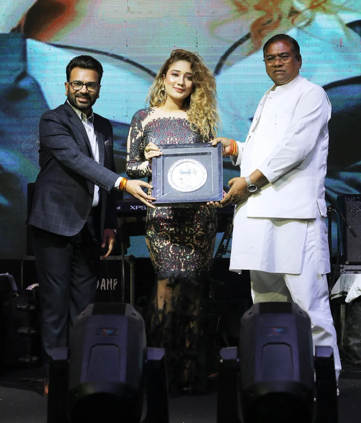 Singer Megha Kishore receives an award