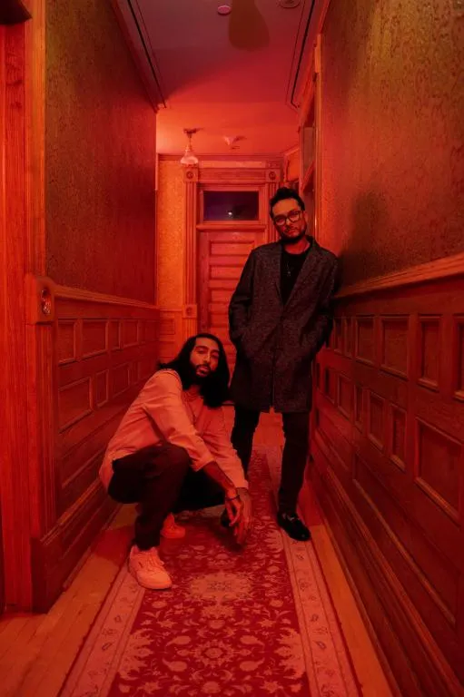 (L-R) Tesher and Raghav Mathur pose together
