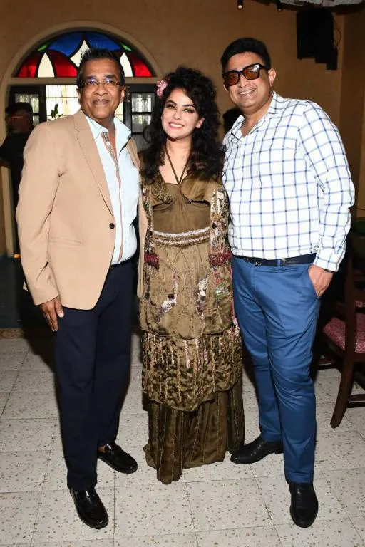 K.S. Ramakrishnan ( Founder - Eatopia Holdings) Sara Arfeen Khan with Suraj Shetty ( Restauranteur) during Madeira Carnival at 1BHK (Vashi)