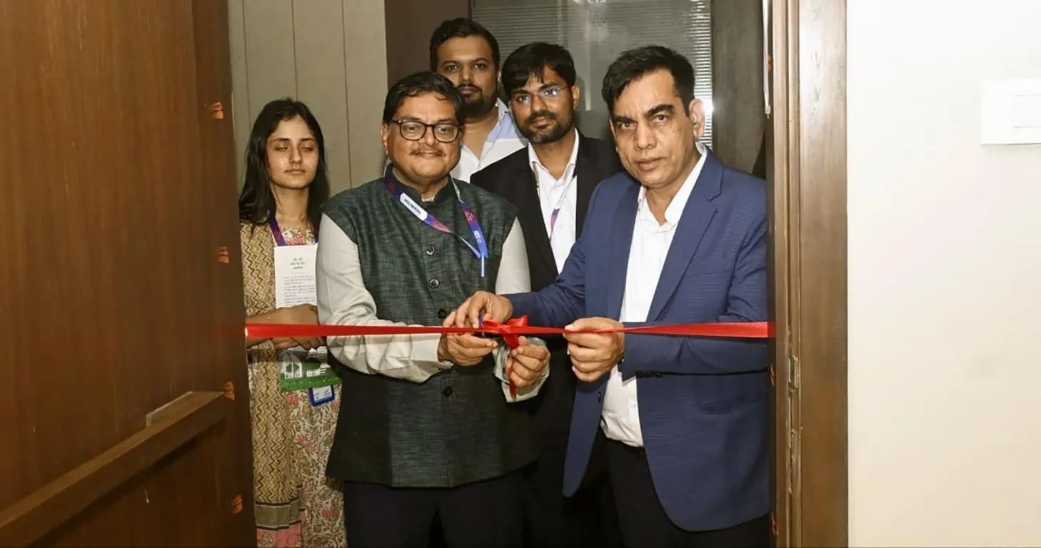 Sanjay Prakash & Dr. Dharmendra Kumar cutting the ribbon