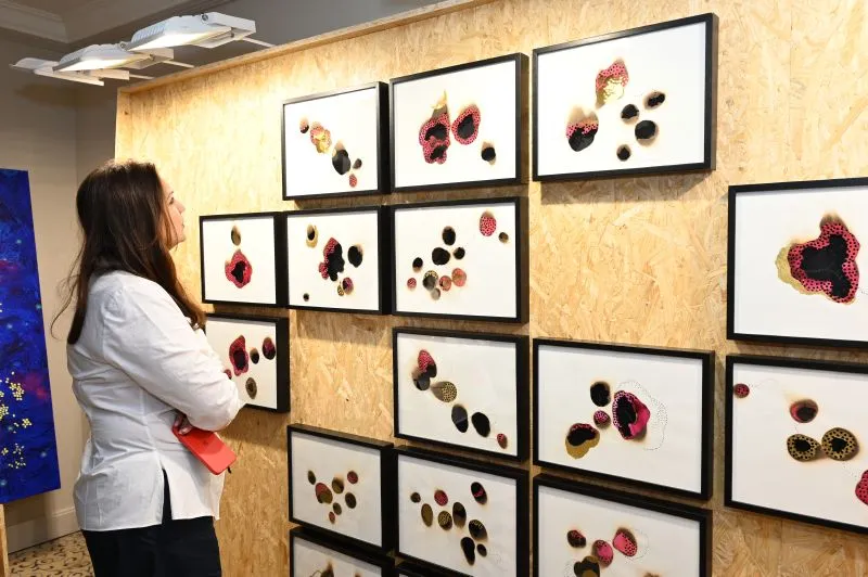 Guest viewing the art at Artix